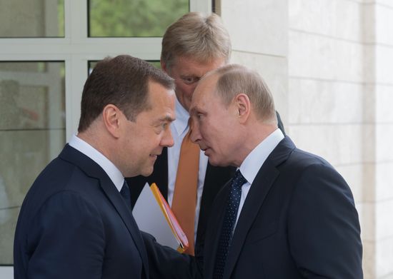 President Vladimir Putin meets with German Chancellor Angela Merkel