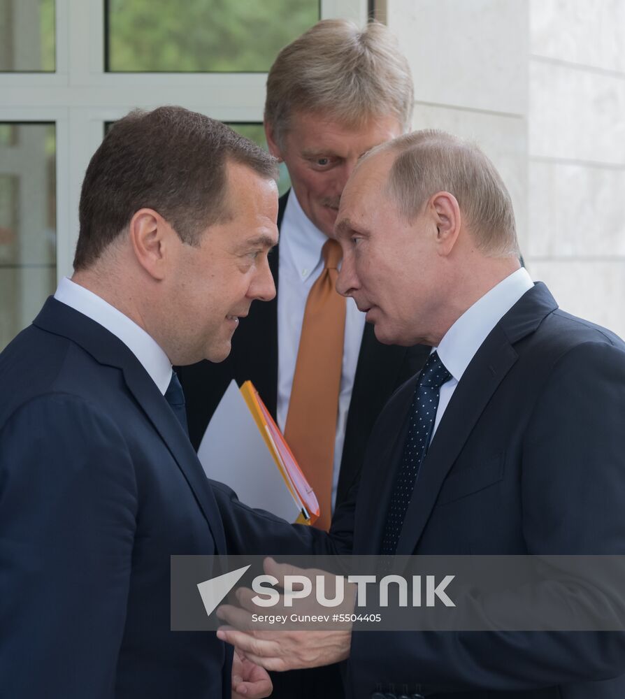 President Vladimir Putin meets with German Chancellor Angela Merkel