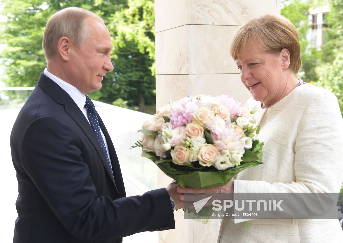 President Vladimir Putin meets with German Chancellor Angela Merkel