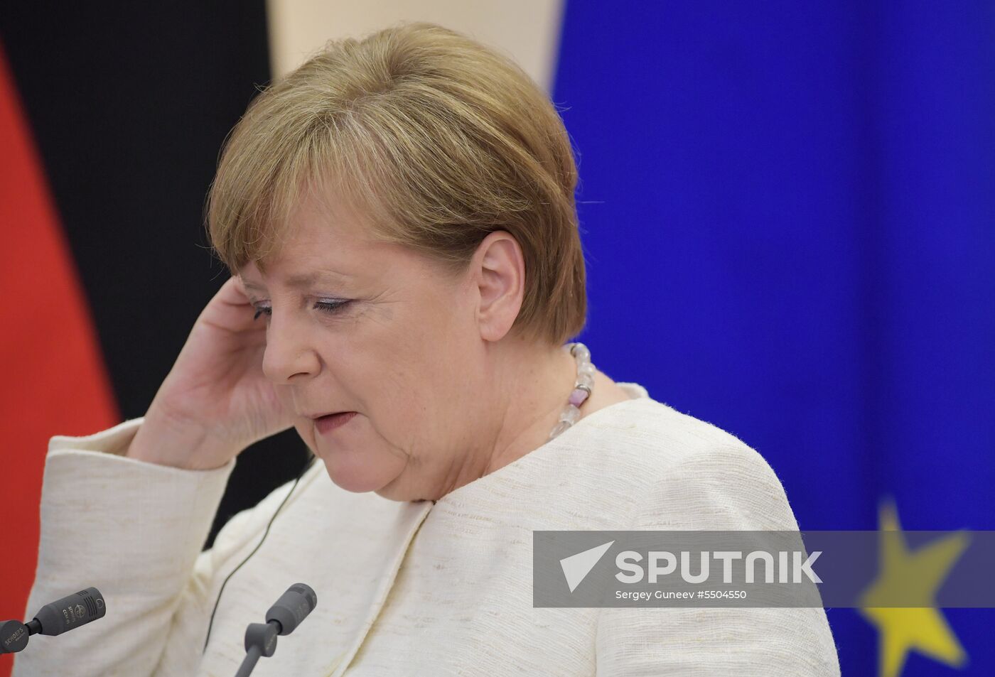 President Vladimir Putin meets with German Chancellor Angela Merkel