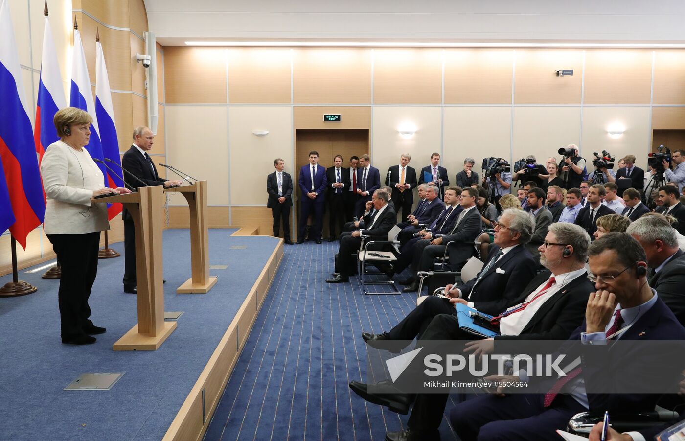 President Vladimir Putin meets with German Chancellor Angela Merkel