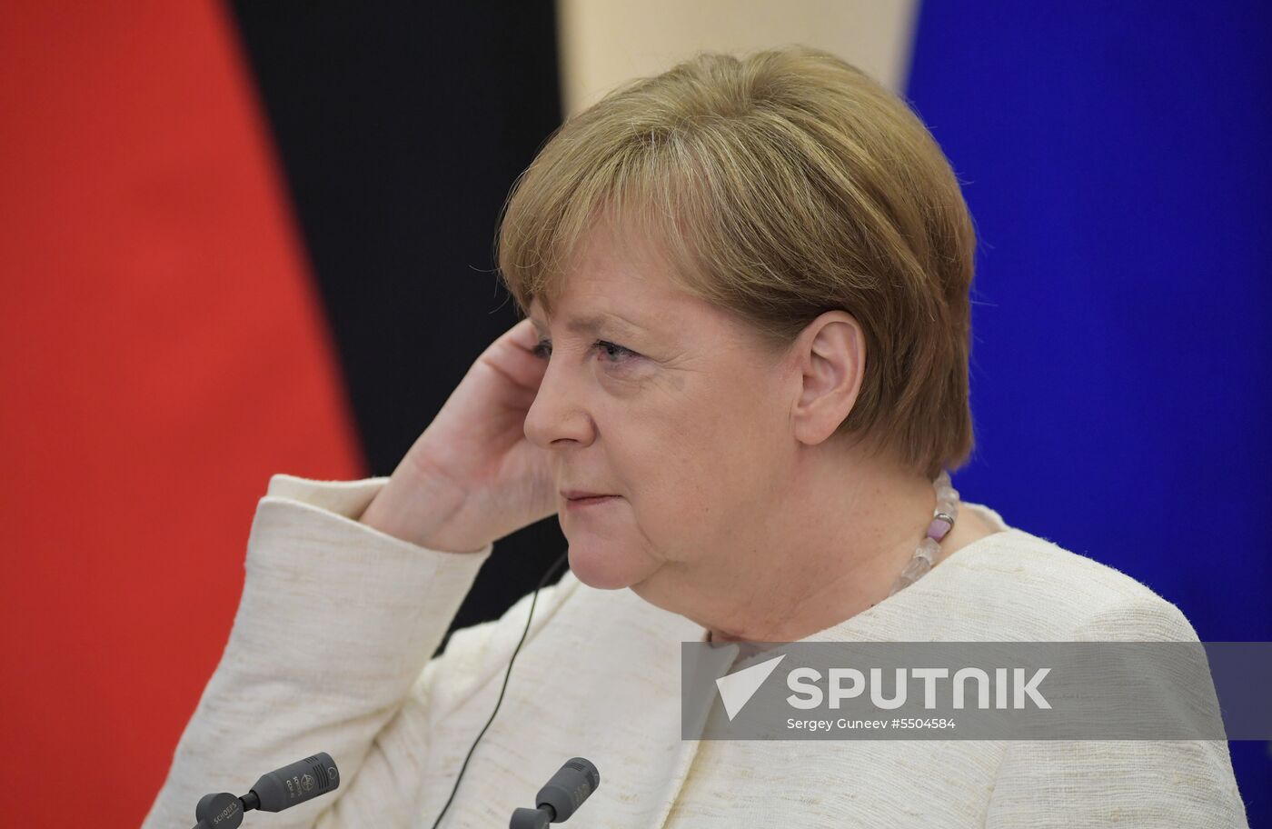 President Vladimir Putin meets with German Chancellor Angela Merkel