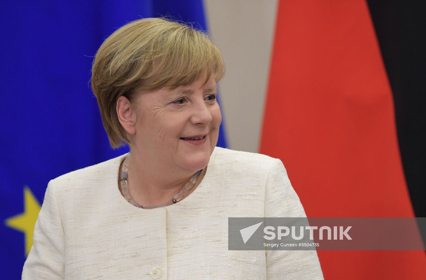 President Vladimir Putin meets with German Chancellor Angela Merkel