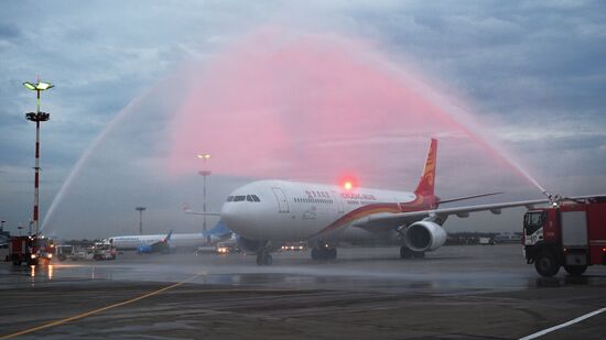 First Hong Kong Airlines flight arrives from Hong Kong in Moscow