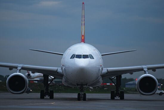 First Hong Kong Airlines flight arrives from Hong Kong in Moscow