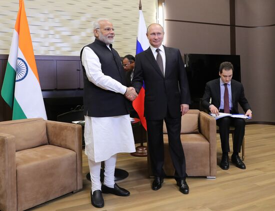 President Vladimir Putin meets with Indian Prime Minister Narendra Modi