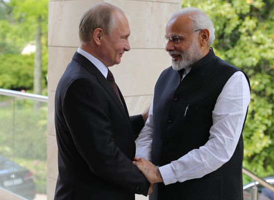 President Vladimir Putin meets with Indian Prime Minister Narendra Modi