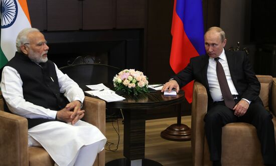 President Vladimir Putin meets with Indian Prime Minister Narendra Modi