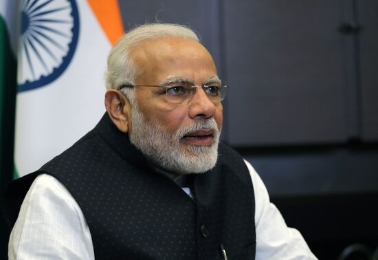 President Vladimir Putin meets with Indian Prime Minister Narendra Modi