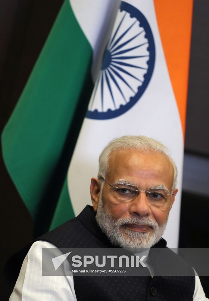 President Vladimir Putin meets with Indian Prime Minister Narendra Modi