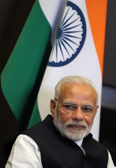 President Vladimir Putin meets with Indian Prime Minister Narendra Modi