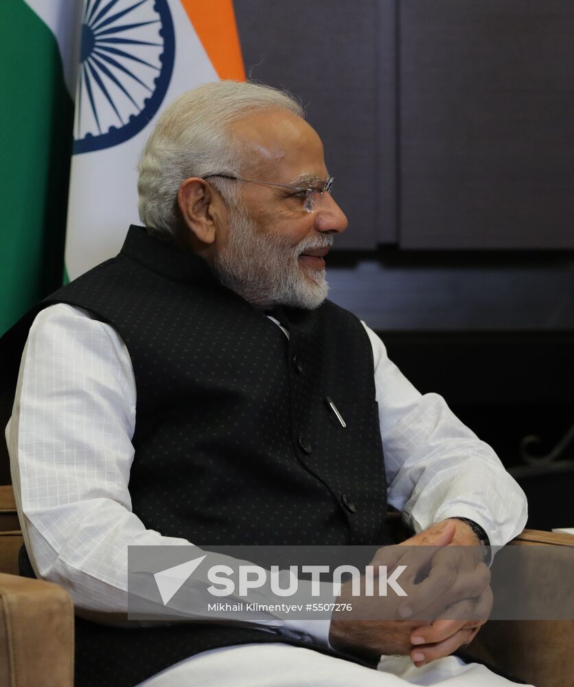 President Vladimir Putin meets with Indian Prime Minister Narendra Modi