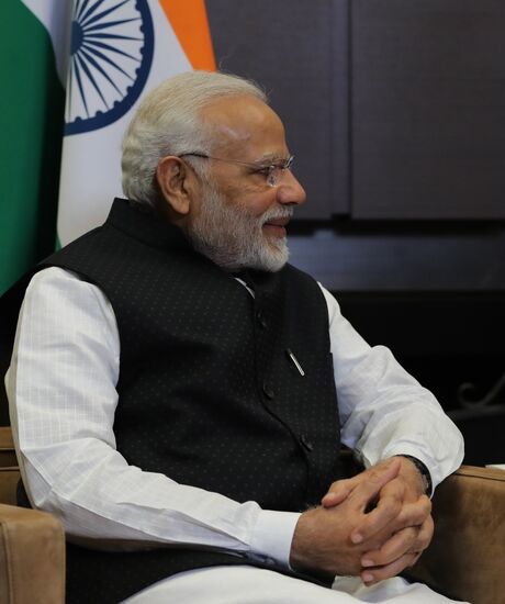 President Vladimir Putin meets with Indian Prime Minister Narendra Modi