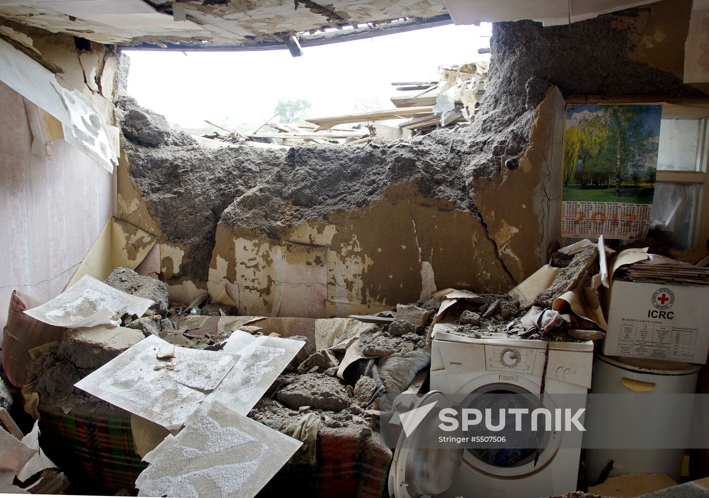 Aftermath of shelling of residential areas in Donbass by Ukrainian armed forces