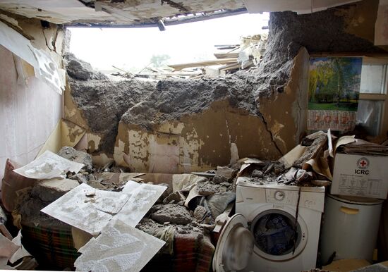 Aftermath of shelling of residential areas in Donbass by Ukrainian armed forces