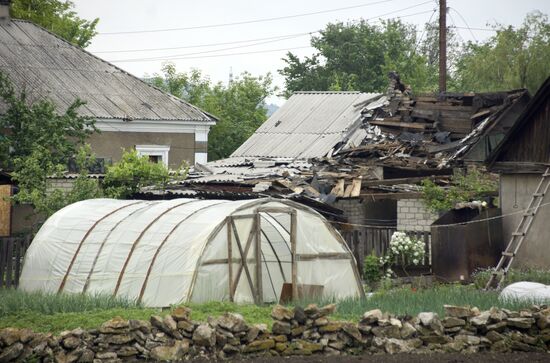 Aftermath of shelling of residential areas in Donbass by Ukrainian armed forces