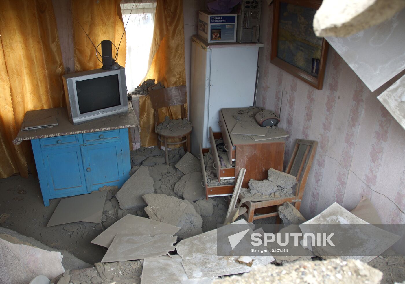 Aftermath of shelling of residential areas in Donbass by Ukrainian armed forces