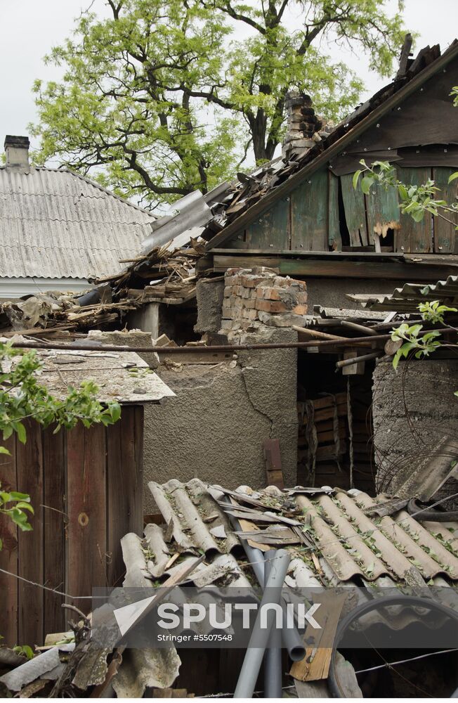 Aftermath of shelling of residential areas in Donbass by Ukrainian armed forces