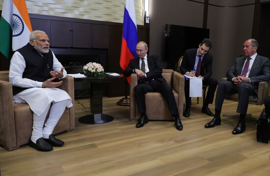President Vladimir Putin meets with Indian Prime Minister Narendra Modi