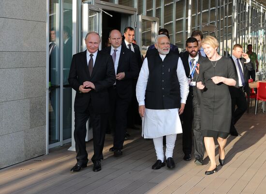 President Vladimir Putin meets with Indian Prime Minister Narendra Modi