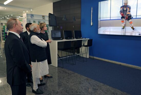 President Vladimir Putin meets with Indian Prime Minister Narendra Modi