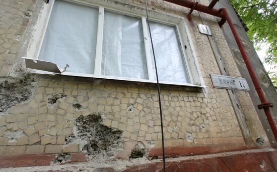 Aftermath of shelling of residential areas in Donbass by Ukrainian armed forces