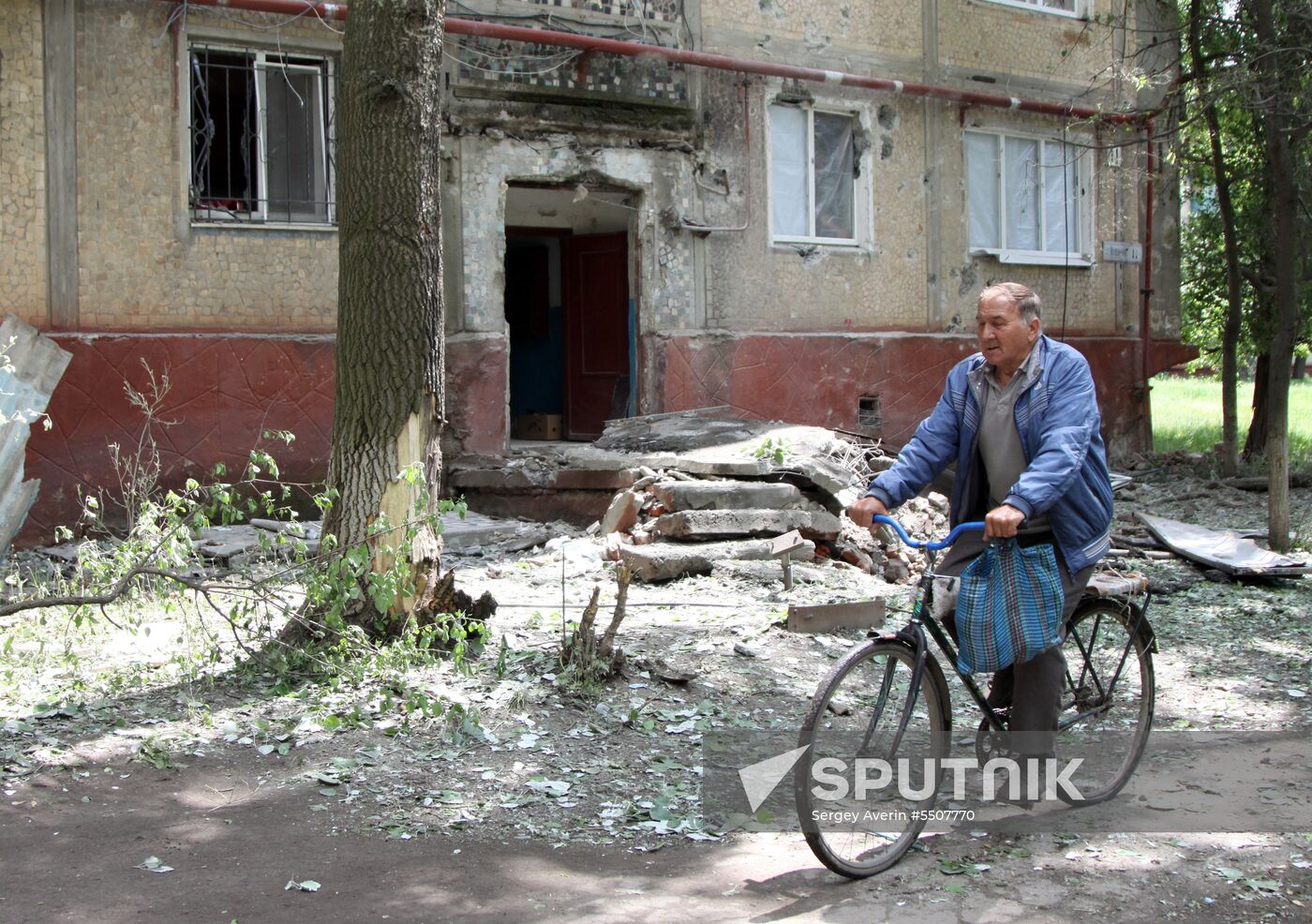 Aftermath of shelling of residential areas in Donbass by Ukrainian armed forces
