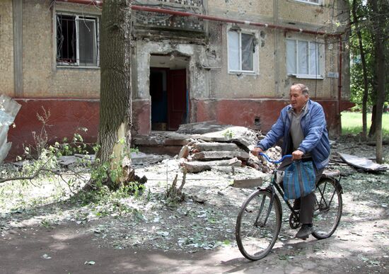 Aftermath of shelling of residential areas in Donbass by Ukrainian armed forces