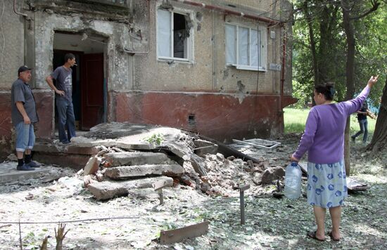 Aftermath of shelling of residential areas in Donbass by Ukrainian armed forces
