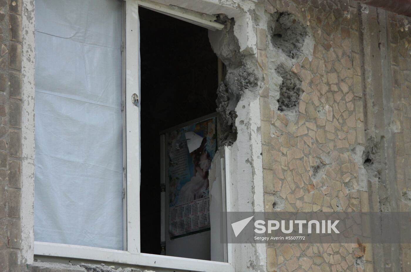 Aftermath of shelling of residential areas in Donbass by Ukrainian armed forces