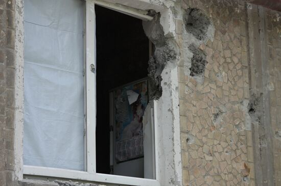 Aftermath of shelling of residential areas in Donbass by Ukrainian armed forces