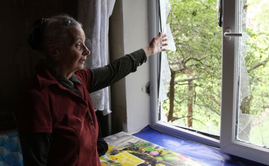 Aftermath of shelling of residential areas in Donbass by Ukrainian armed forces