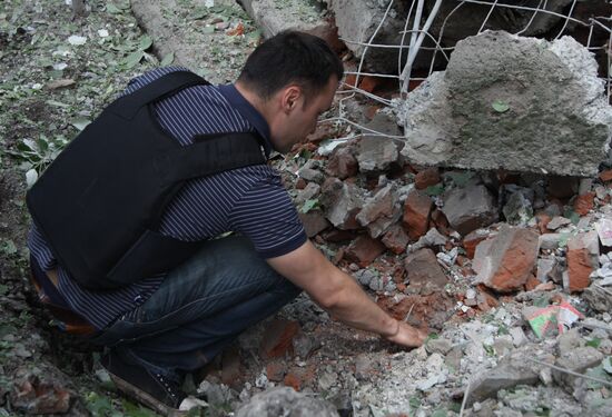 Aftermath of shelling of residential areas in Donbass by Ukrainian armed forces