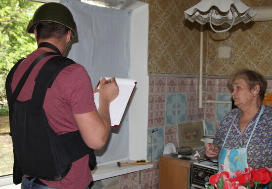 Aftermath of shelling of residential areas in Donbass by Ukrainian armed forces