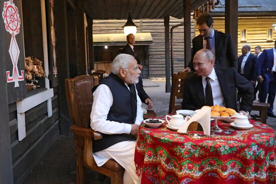 President Vladimir Putin meets with Indian Prime Minister Narendra Modi