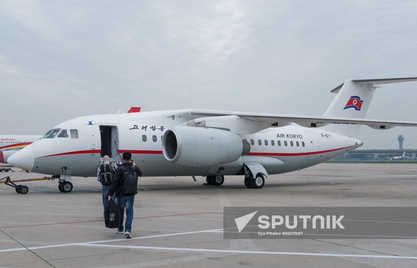 Representatives of world media fly from Beijing to attend North Korean nuclear test site closure