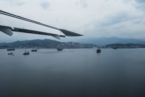 Representatives of world media fly from Beijing to attend North Korean nuclear test site closure
