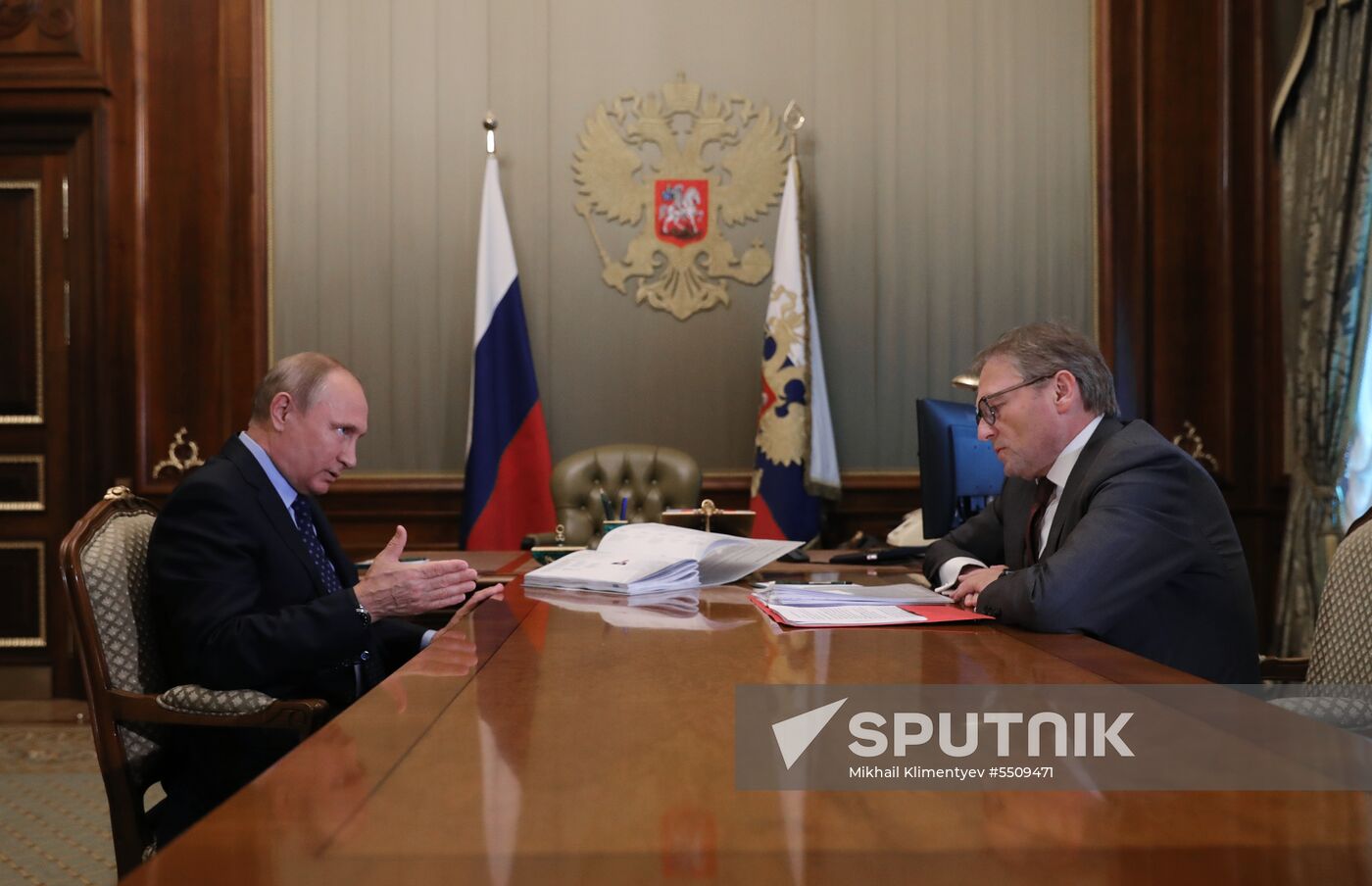 Russian President Vladimir Putin meets with Commissioner for Entrepreneurs' Rights Boris Titov