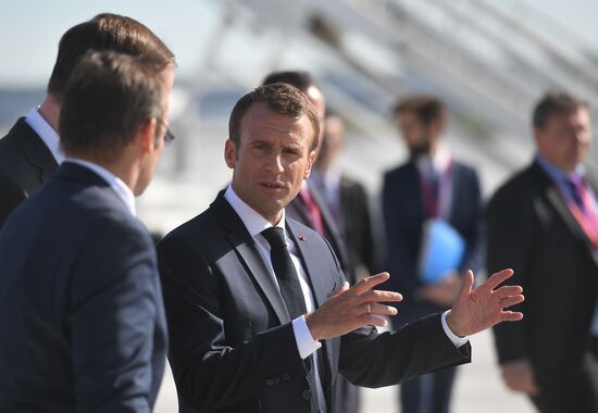 French President Emmanuel Macron arrives in St. Petersburg