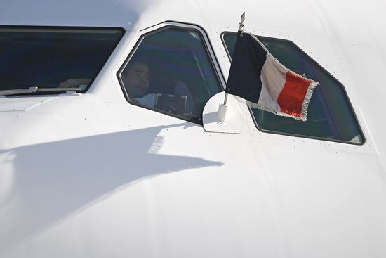 French President Emmanuel Macron arrives in St. Petersburg