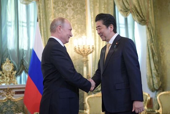 Vladimir Putin holds talks with Japanese Prime Minister Shinzo Abe