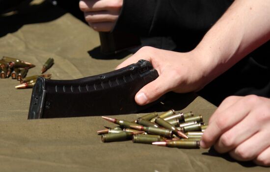 School students practice in firing from Kalashnikov rifle in Donetsk People’s Republic