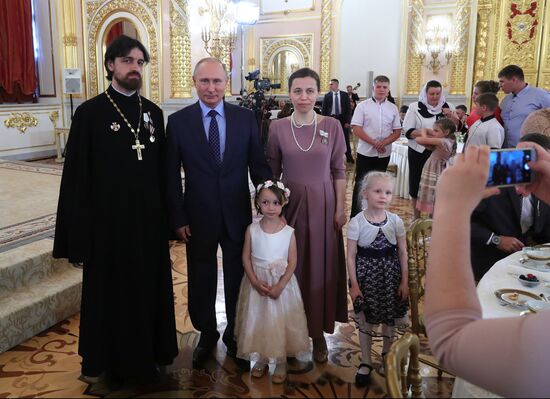 President Vladimir Putin awards Orders of Parental Glory