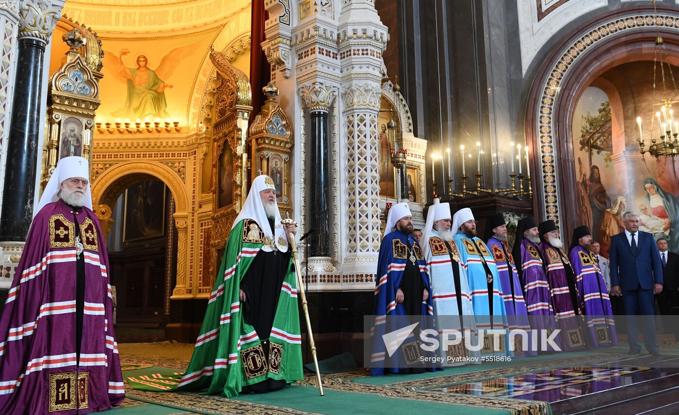 Russian Minister of Internal Affairs Vladimir Kolokoltsev passes ancient icons to Patriarch Kirill