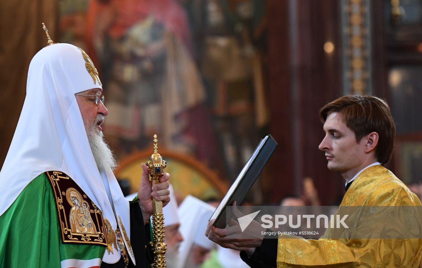 Russian Minister of Internal Affairs Vladimir Kolokoltsev passes ancient icons to Patriarch Kirill