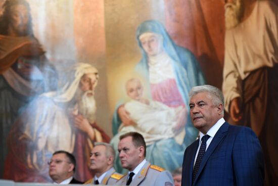 Russian Minister of Internal Affairs Vladimir Kolokoltsev passes ancient icons to Patriarch Kirill