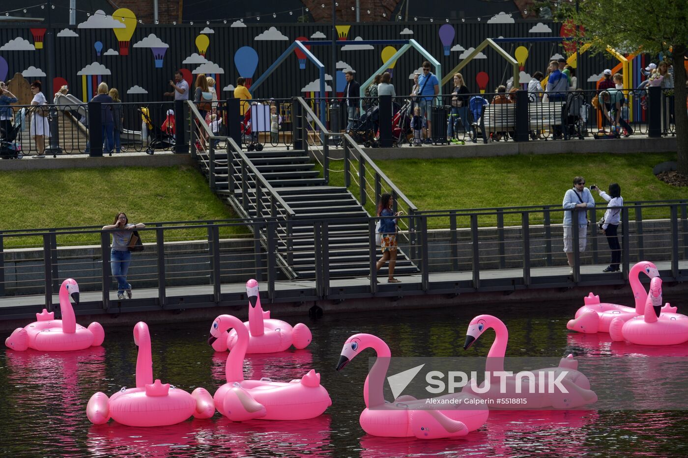 Beach with inflatable pink flamingos opens on St. Petersburg's New Holland Island