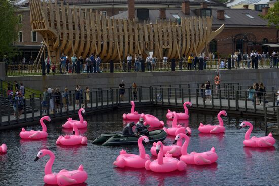 Beach with inflatable pink flamingos opens on St. Petersburg's New Holland Island