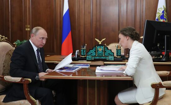 President Vladimir Putin meets with Children's Rights Commissioner Anna Kuznetsova