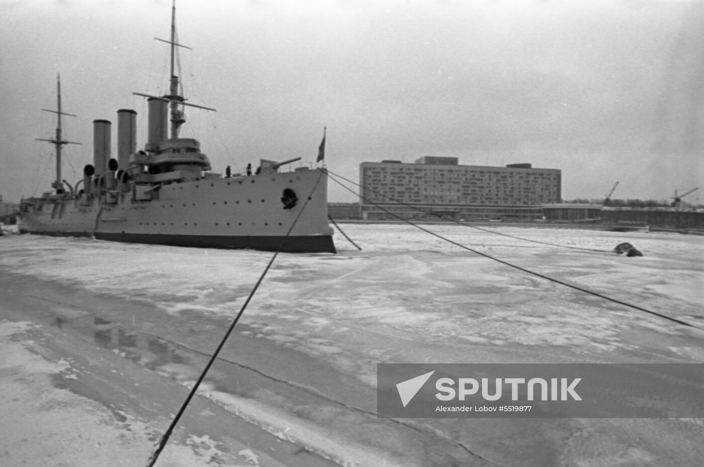 Cruiser Avrora against background of Leningrad Hotel